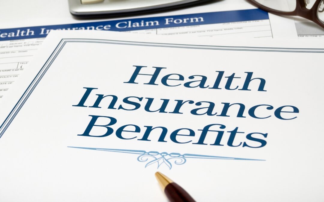 a piece of paper that says "health insurance benefits"