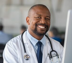 a doctor smiling at the viewer