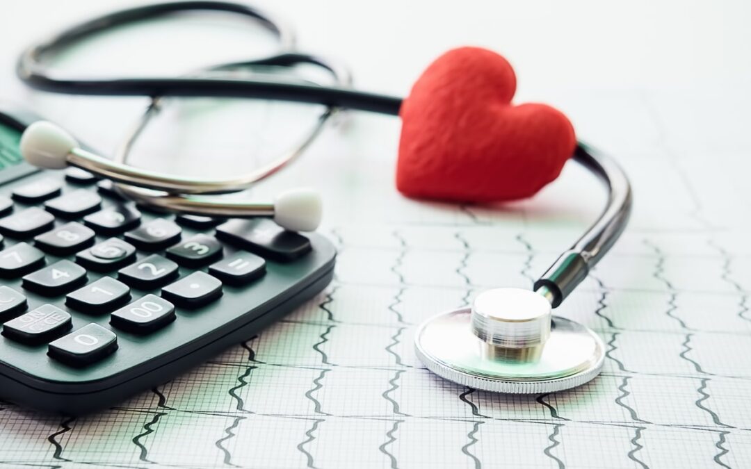 image of a heat, calculator and medical appliances to showcase changing health insurance providers